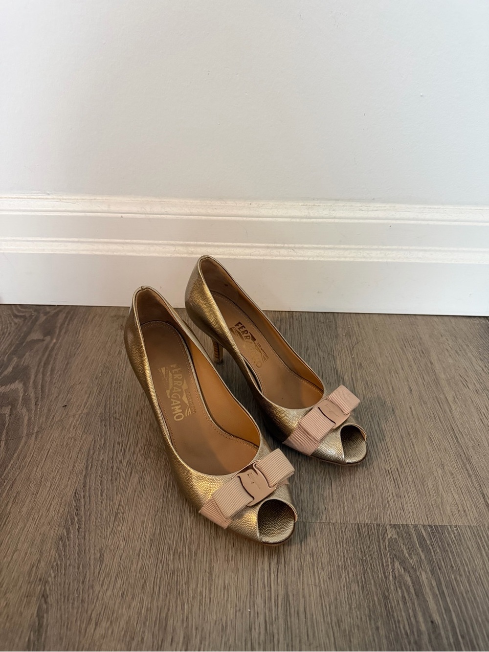 Salvatore Ferragamo Metallic Gold Peep-Toe Pumps with Blush Bow